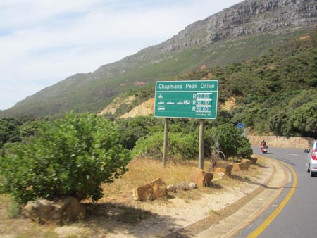 Optimal Kurier fährt den Chapmans Peak Drive zurück vom "Cape of Good Hope"